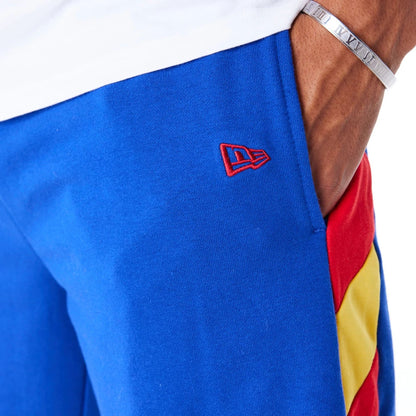 The Male model is wearing Denver Nuggets NBA Panel Blue Oversized Shorts 4