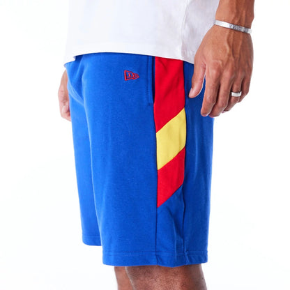 The Male model is wearing Denver Nuggets NBA Panel Blue Oversized Shorts 2