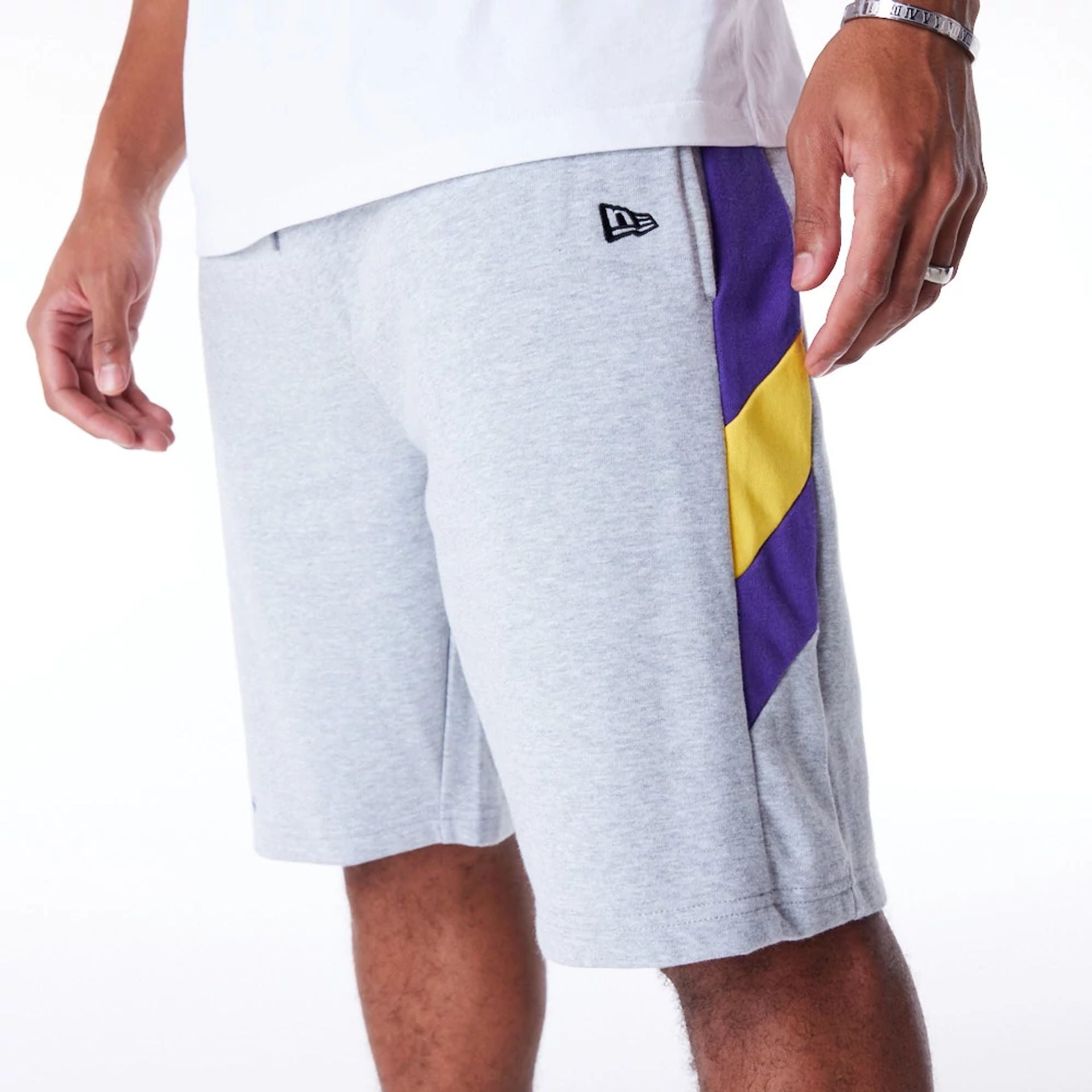 The Male model is wearing LA Lakers NBA Panel Grey Oversized Shorts 1