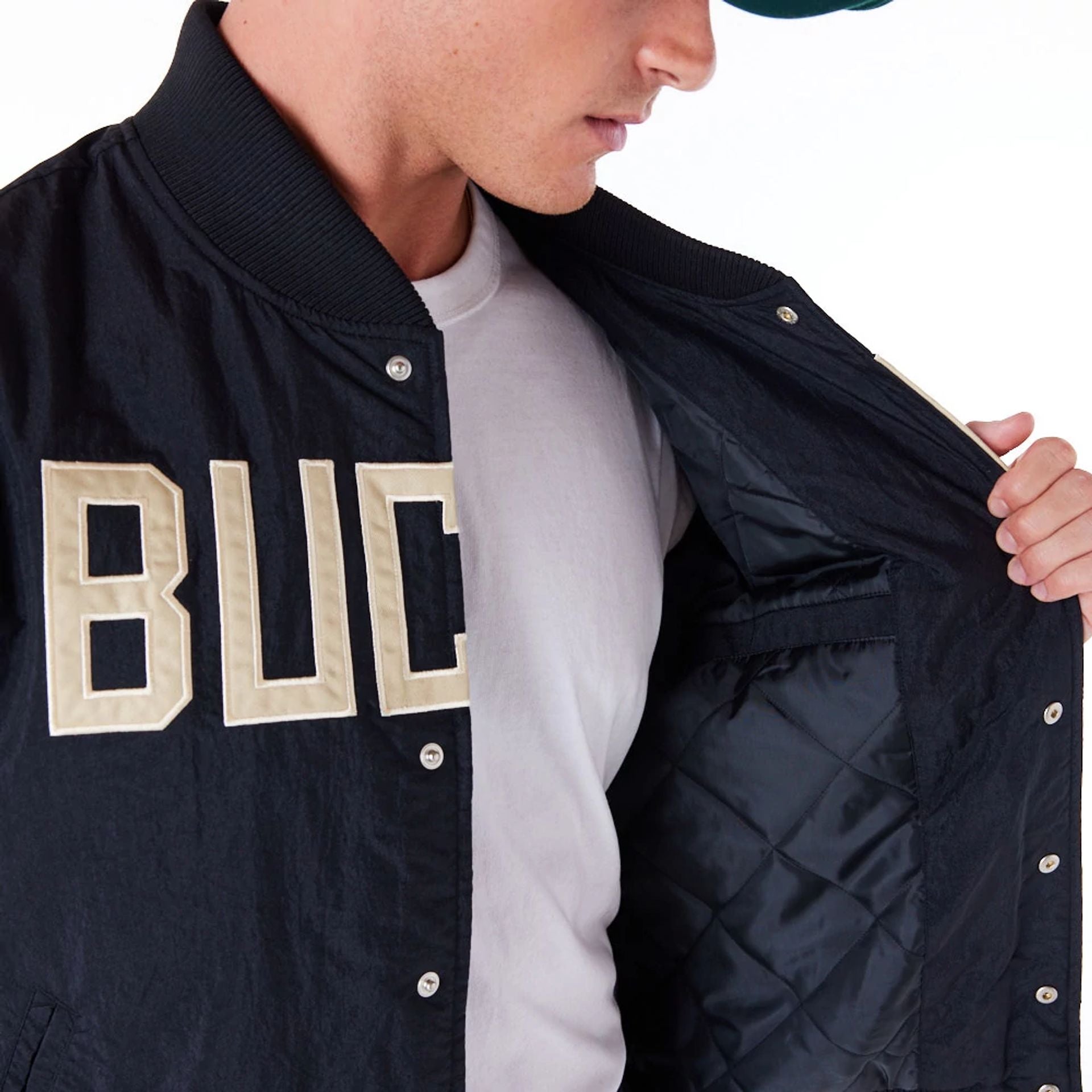 The Male model is wearing Milwaukee Bucks NBA Panel Black Bomber Jacket 3