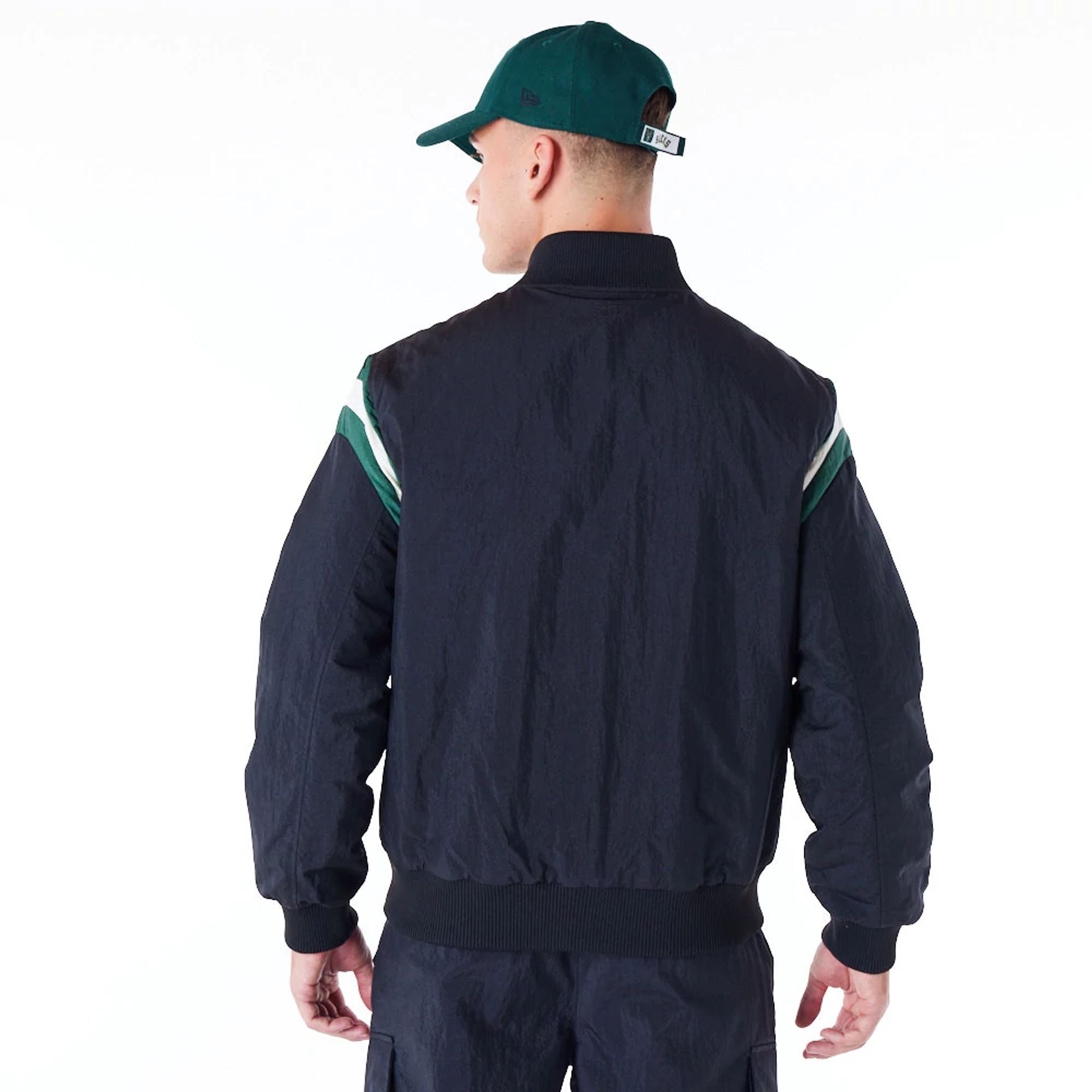 The Male model is wearing Milwaukee Bucks NBA Panel Black Bomber Jacket 2