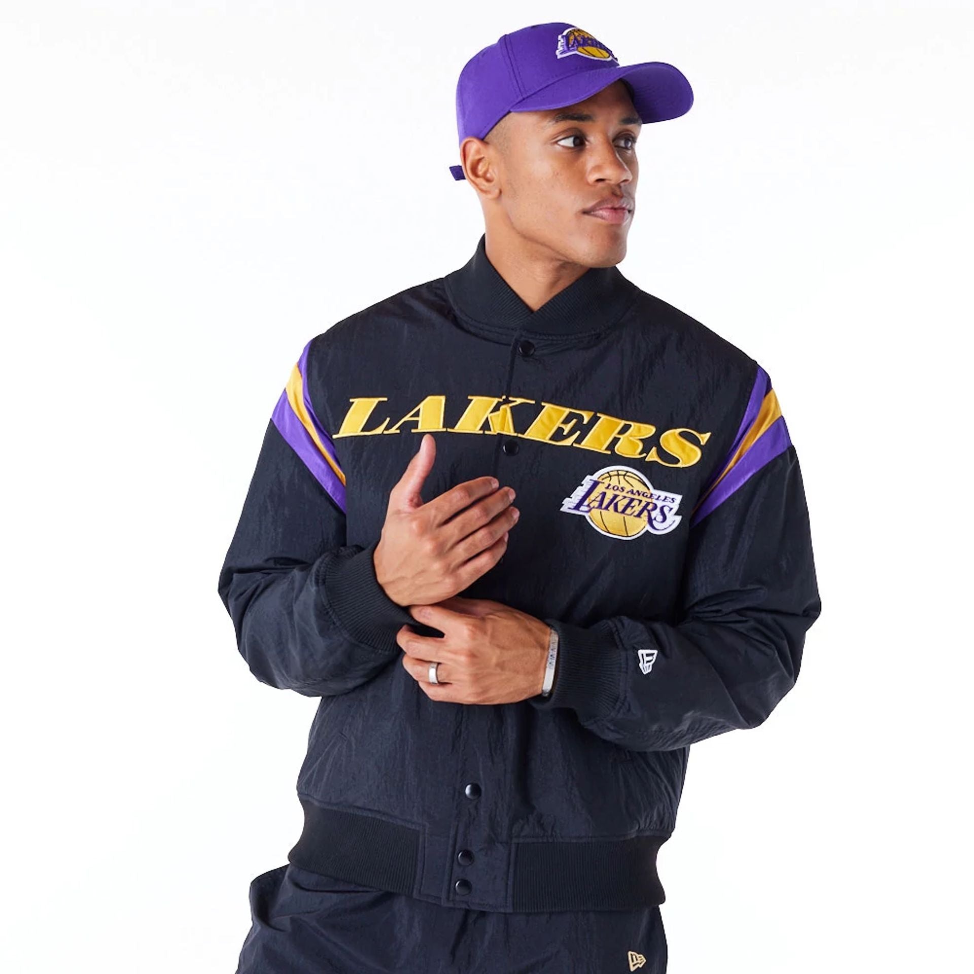 The Male model is wearing LA Lakers NBA Panel Black Bomber Jacket 1