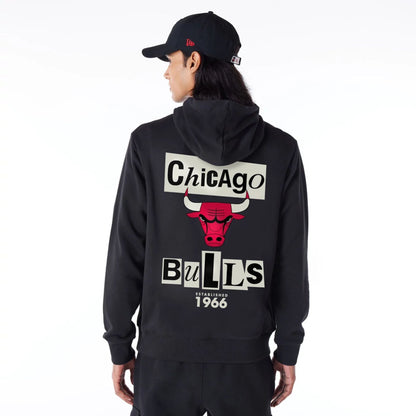 The Male model is wearing Chicago Bulls Newspaper Graphic Black Pullover Hoodie 4