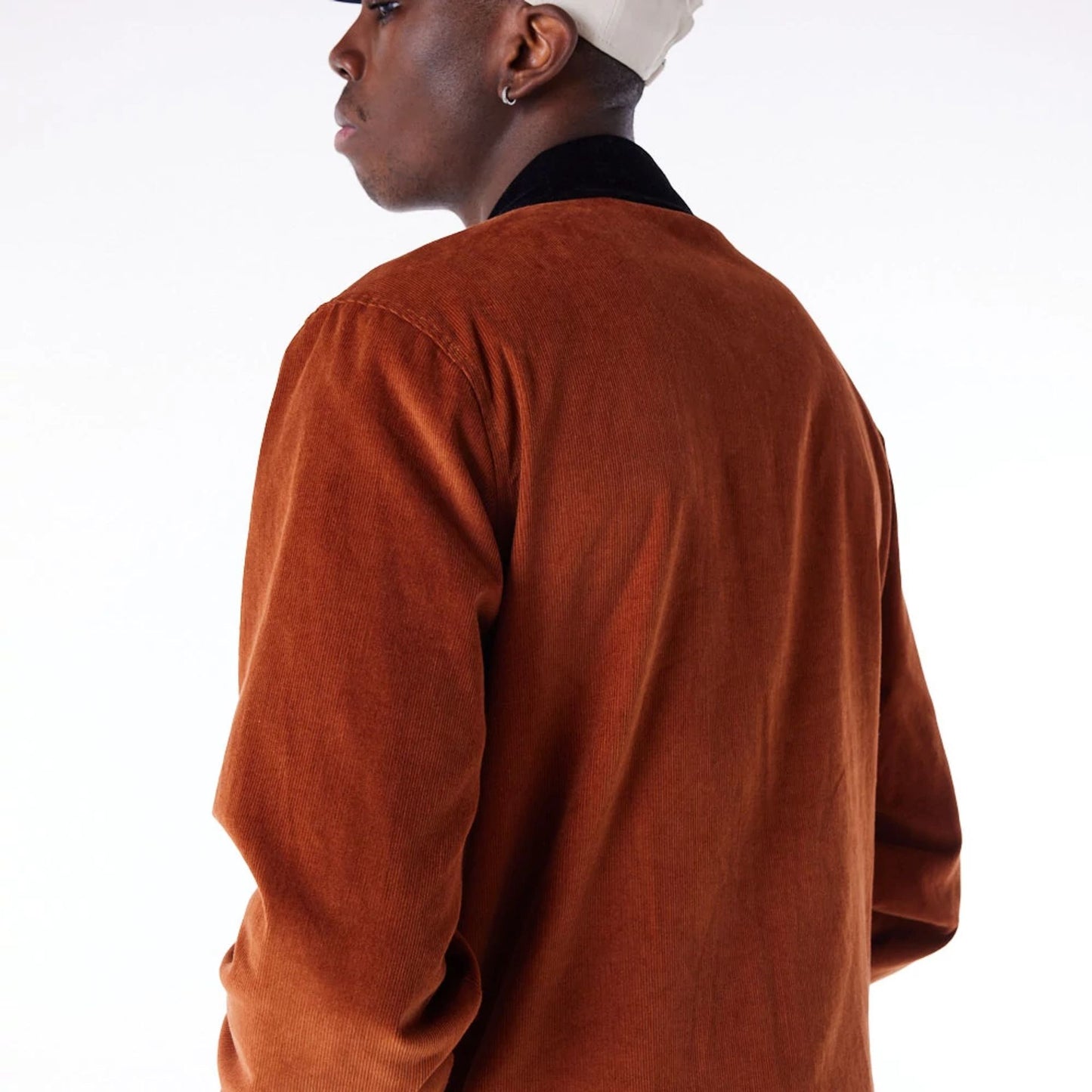 The Male model is wearing New Era Brown Cord Coach Jacket 8