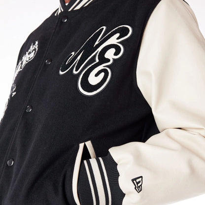 The Male model is wearing New Era Varisty Patch Black Varsity Jacket 3