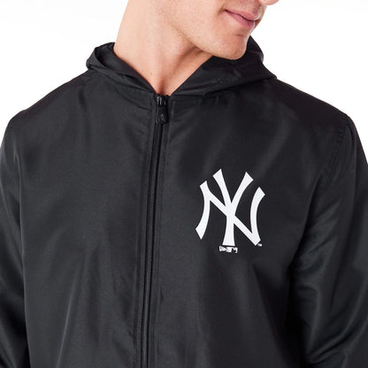 The Male model is wearing New York Yankees MLB Black Coach Jacket 3