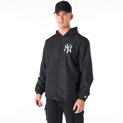 The Male model is wearing New York Yankees MLB Black Coach Jacket 7