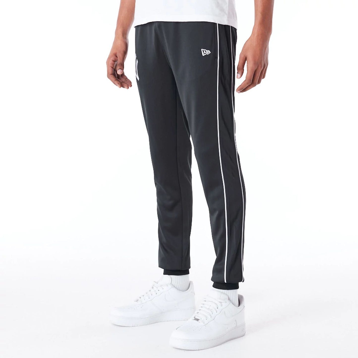 The Male model is wearing New York Yankees MLB Track Pant Black Fleece Track Joggers 7