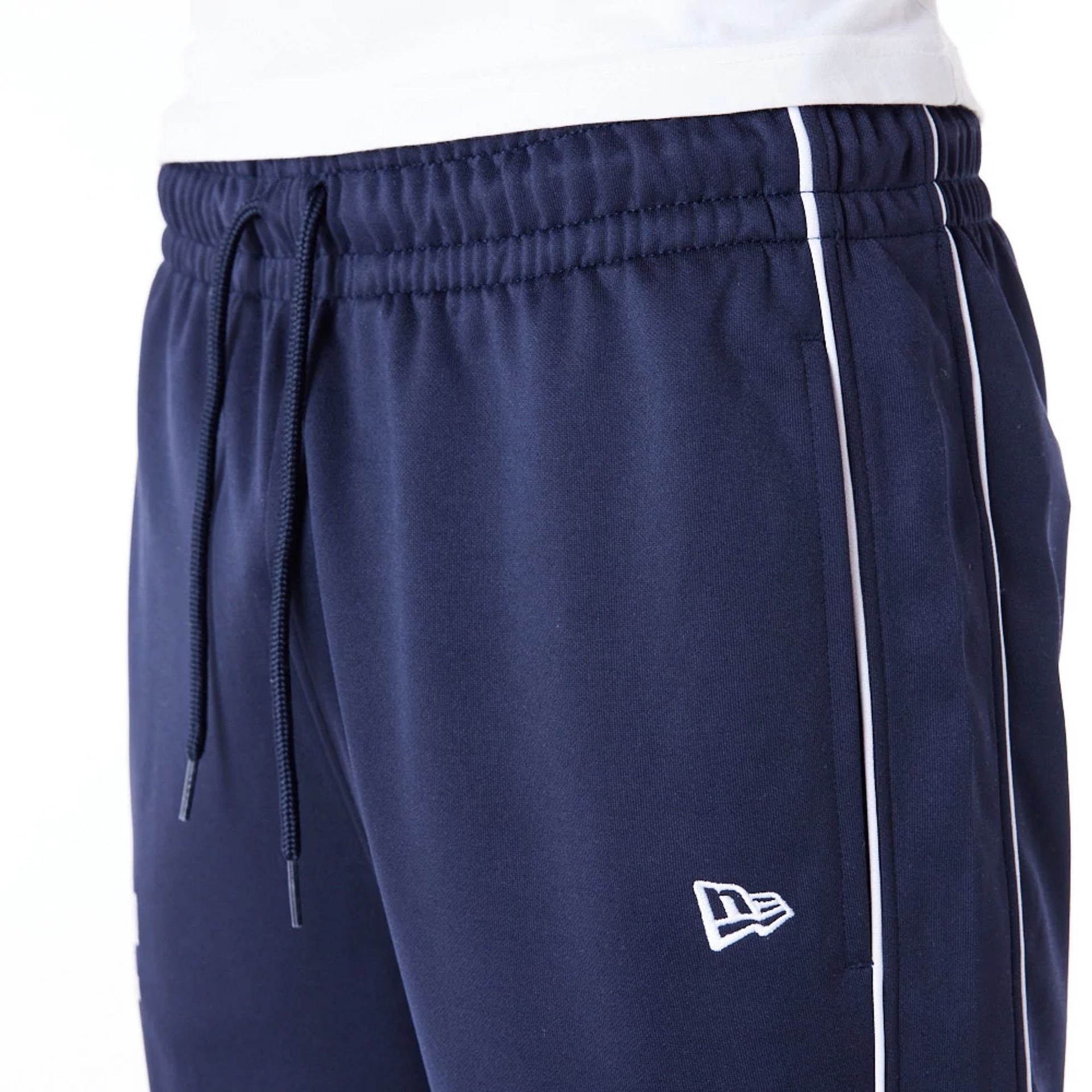 The Male model is wearing LA Dodgers MLB Track Pant Dark Blue Fleece Track Joggers 2