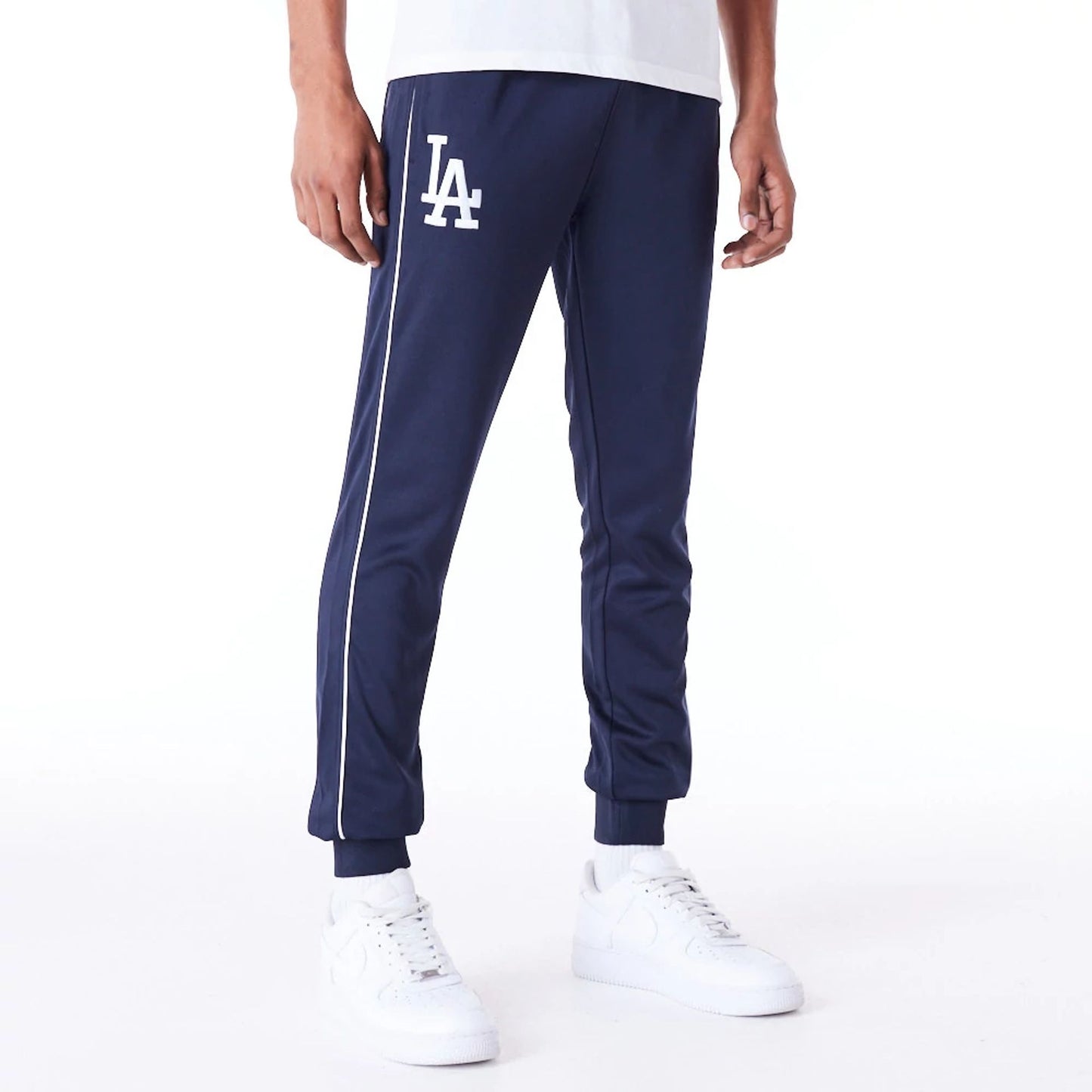 The Male model is wearing LA Dodgers MLB Track Pant Dark Blue Fleece Track Joggers 1