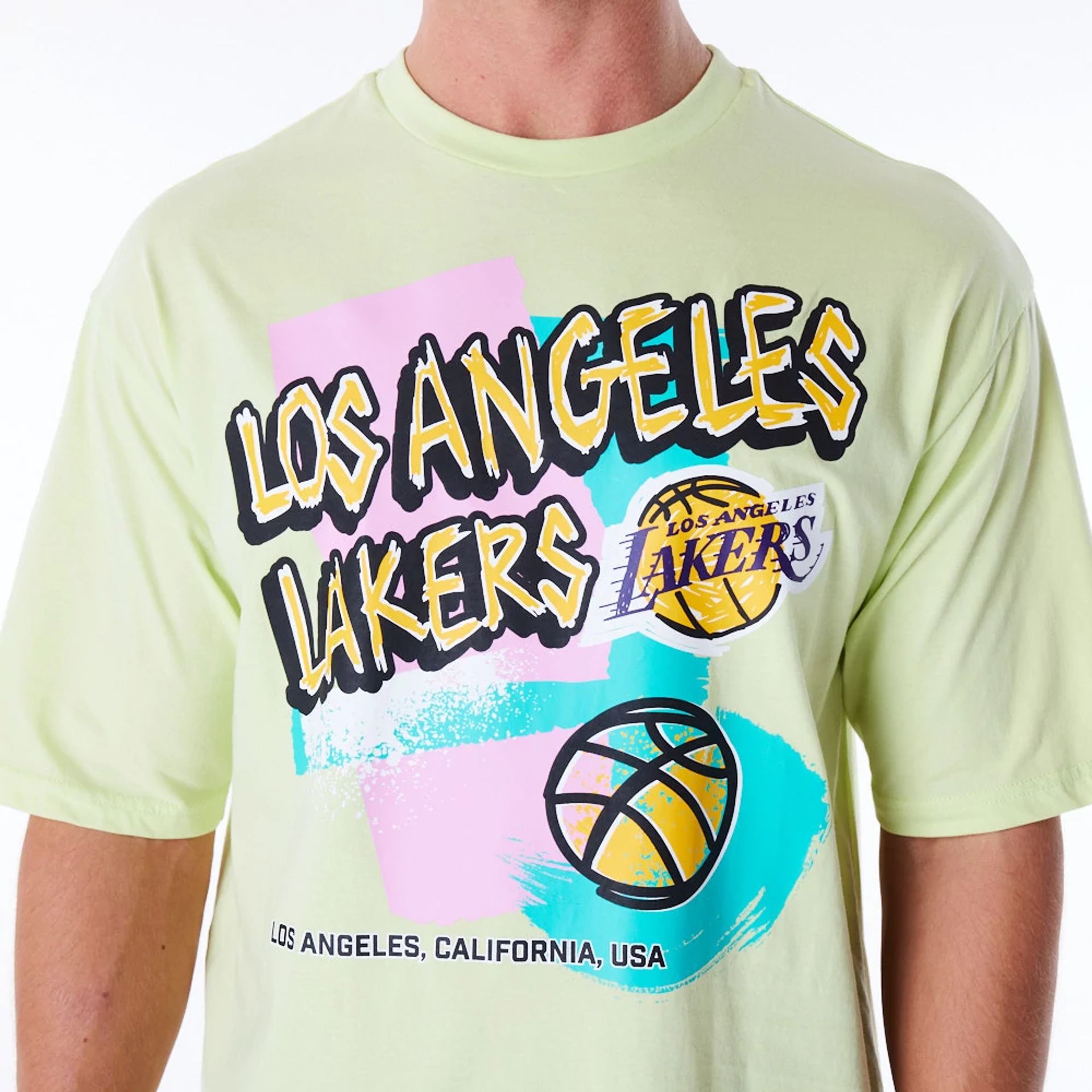 The Male model is wearing LA Lakers Retro Graphic Pastel Green Oversized T-Shirt 3