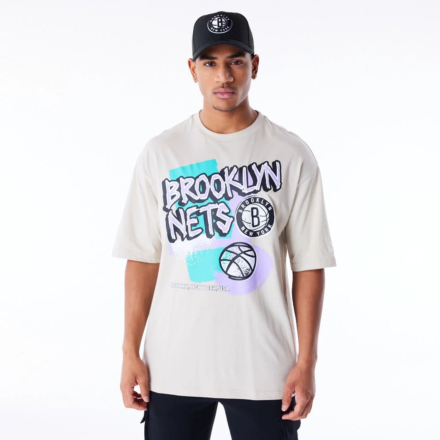 The Male model is wearing Brooklyn Nets Retro Graphic Stone Oversized T-Shirt 1