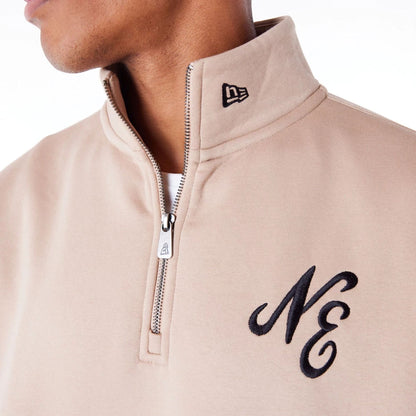 The Male model is wearing New Era Lifestyle Beige Quarter-Zip Sweater 6