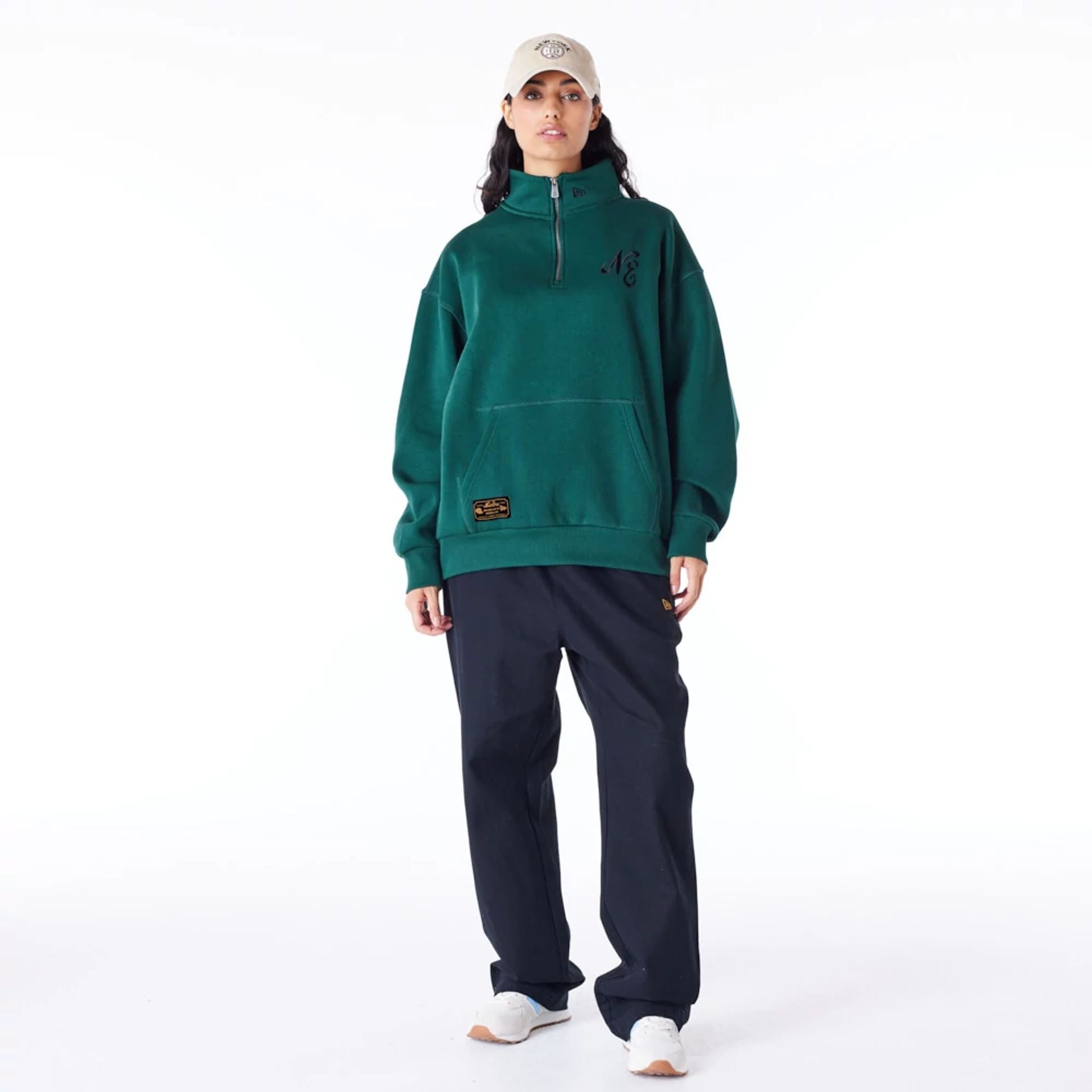 The Male model is wearing New Era Lifestyle Dark Green Quarter-Zip Sweater 11