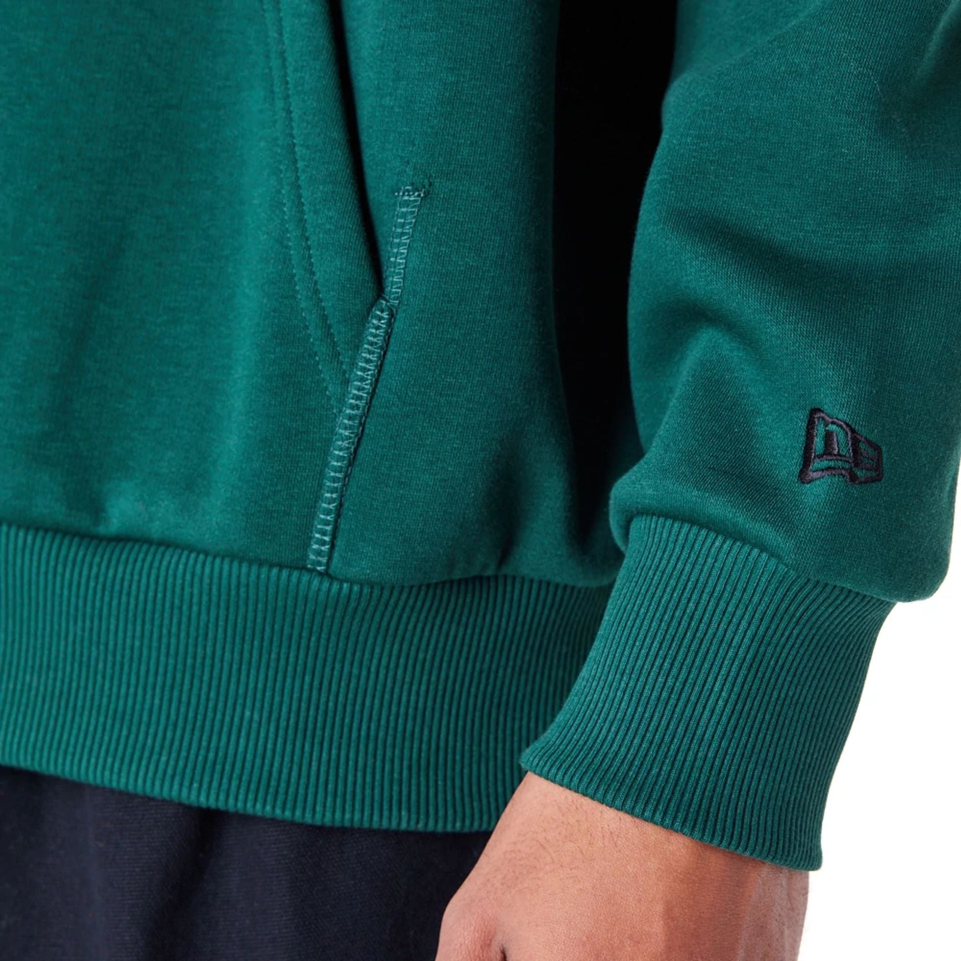 The Male model is wearing New Era Lifestyle Dark Green Quarter-Zip Sweater 4