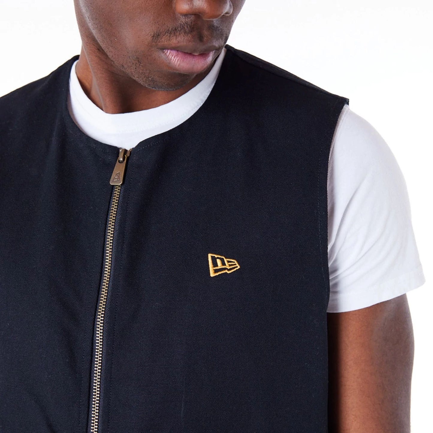 The Male model is wearing New Era Black Utility Vest Top 9