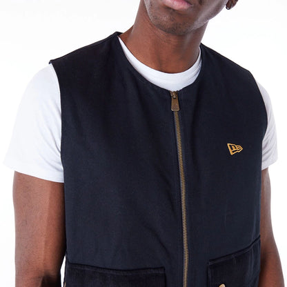 The Male model is wearing New Era Black Utility Vest Top 6