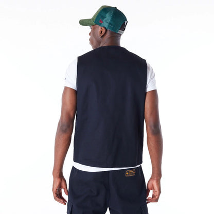 The Male model is wearing New Era Black Utility Vest Top 4