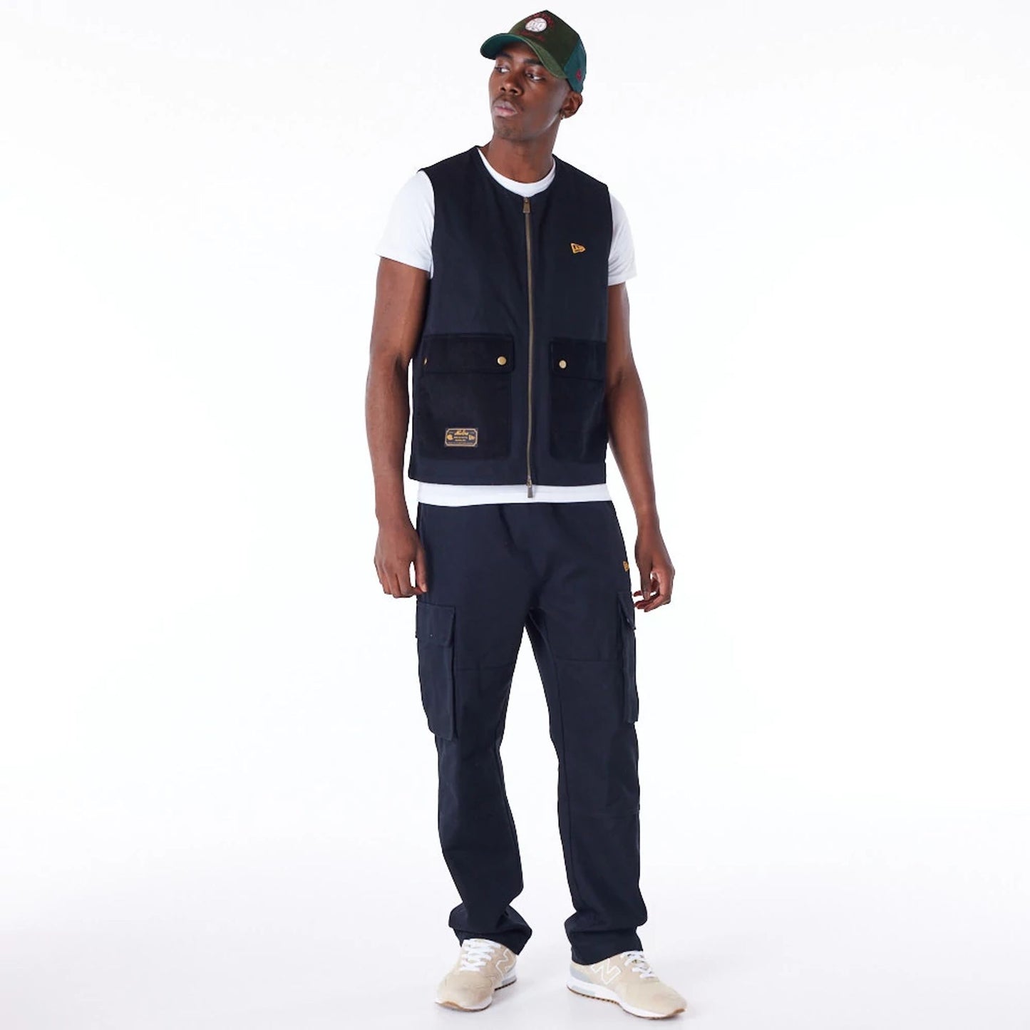 The Male model is wearing New Era Black Utility Vest Top 5