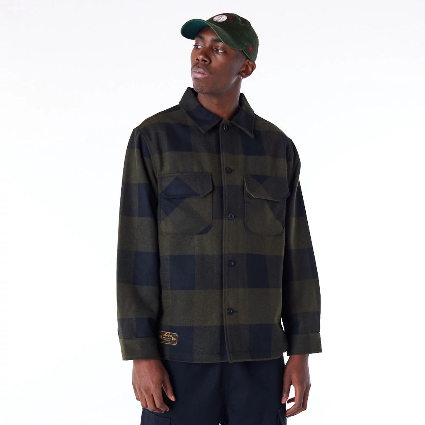 The Male model is wearing New Era Dark Green Shacket 1