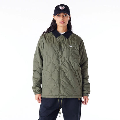 The Male model is wearing New Era Green Quilted Coach Jacket 2