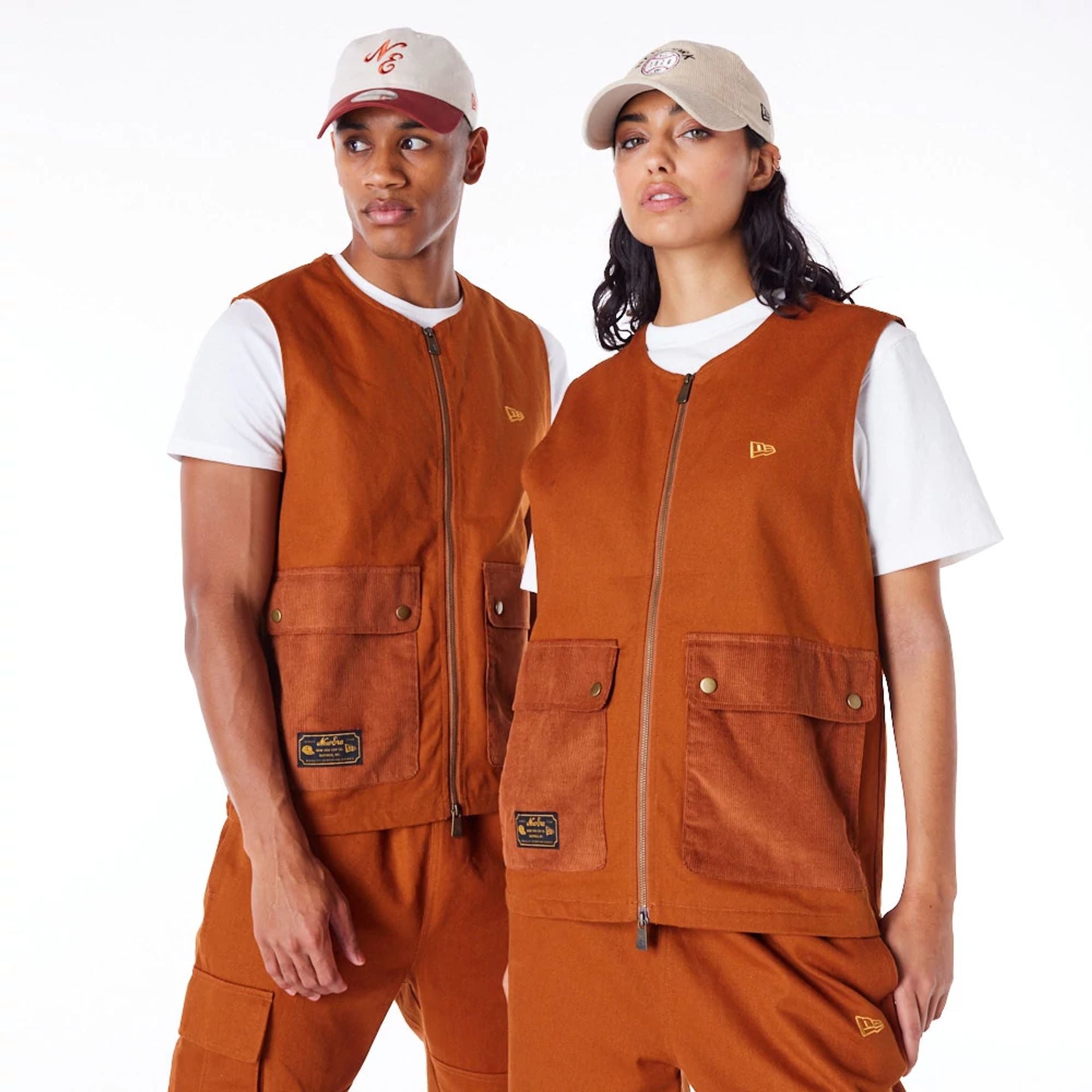 The Male model is wearing New Era Brown Utility Vest Top 1