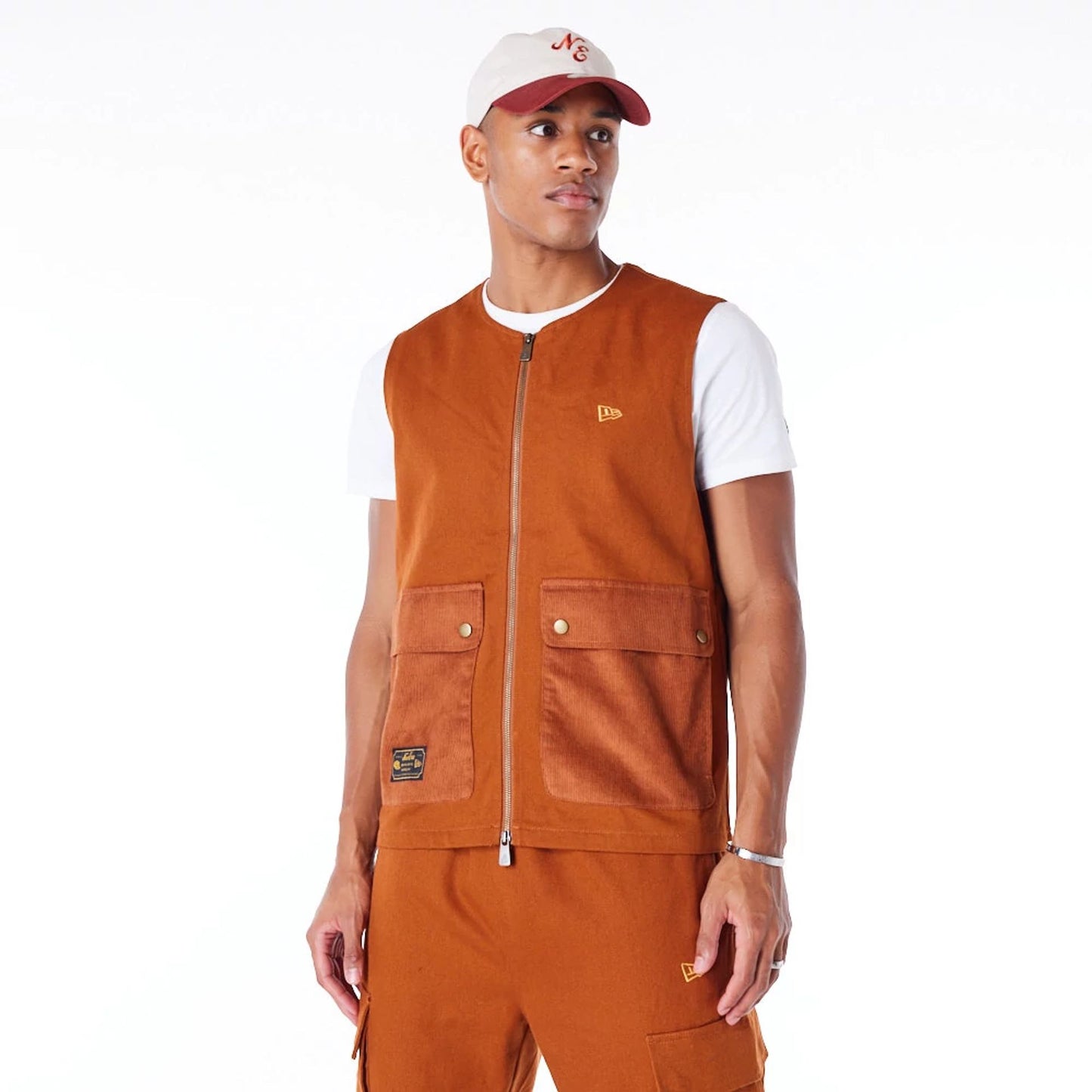 The Male model is wearing New Era Brown Utility Vest Top 9