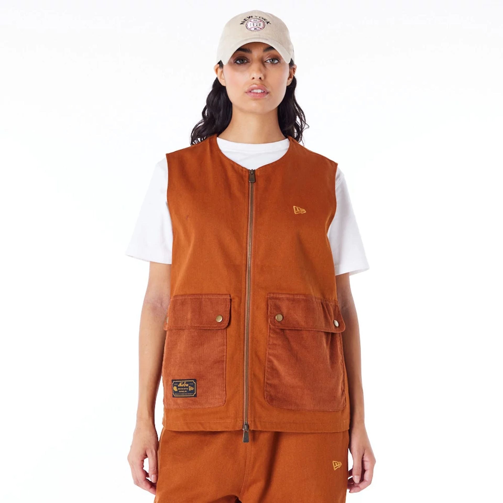 The Male model is wearing New Era Brown Utility Vest Top 10