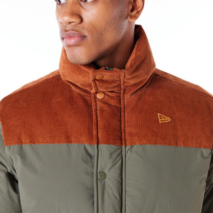 The Male model is wearing New Era Green Canvas Puffer Jacket 6