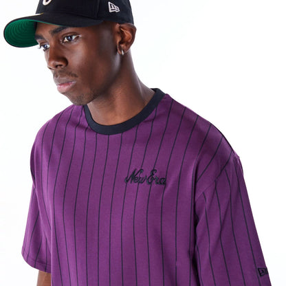 The Male model is wearing New Era Pinstripe Dark Purple Oversized T-Shirt 2