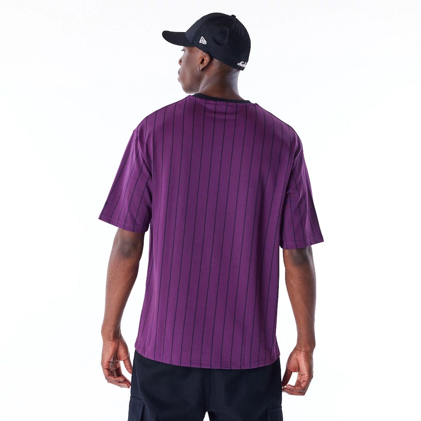 The Male model is wearing New Era Pinstripe Dark Purple Oversized T-Shirt 6