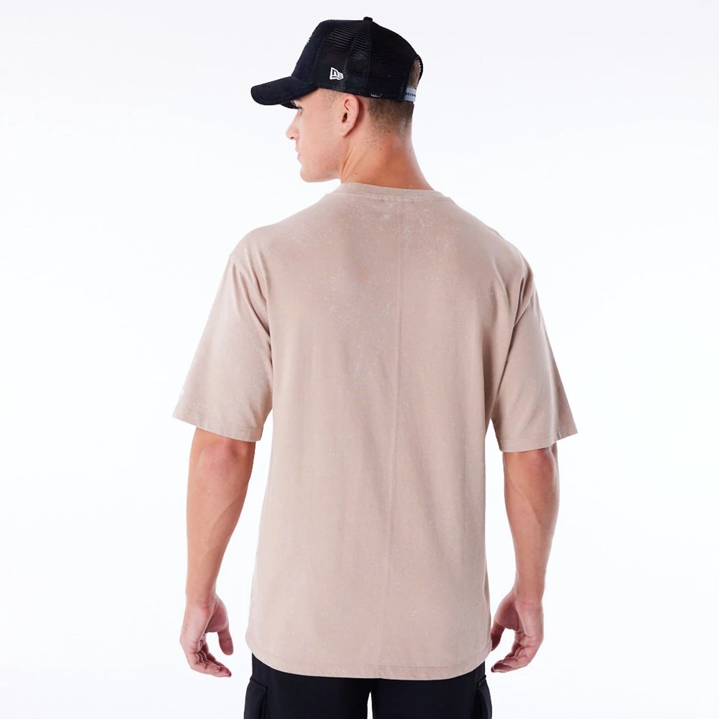 The Male model is wearing New Era Wash Beige Oversized T-Shirt 5