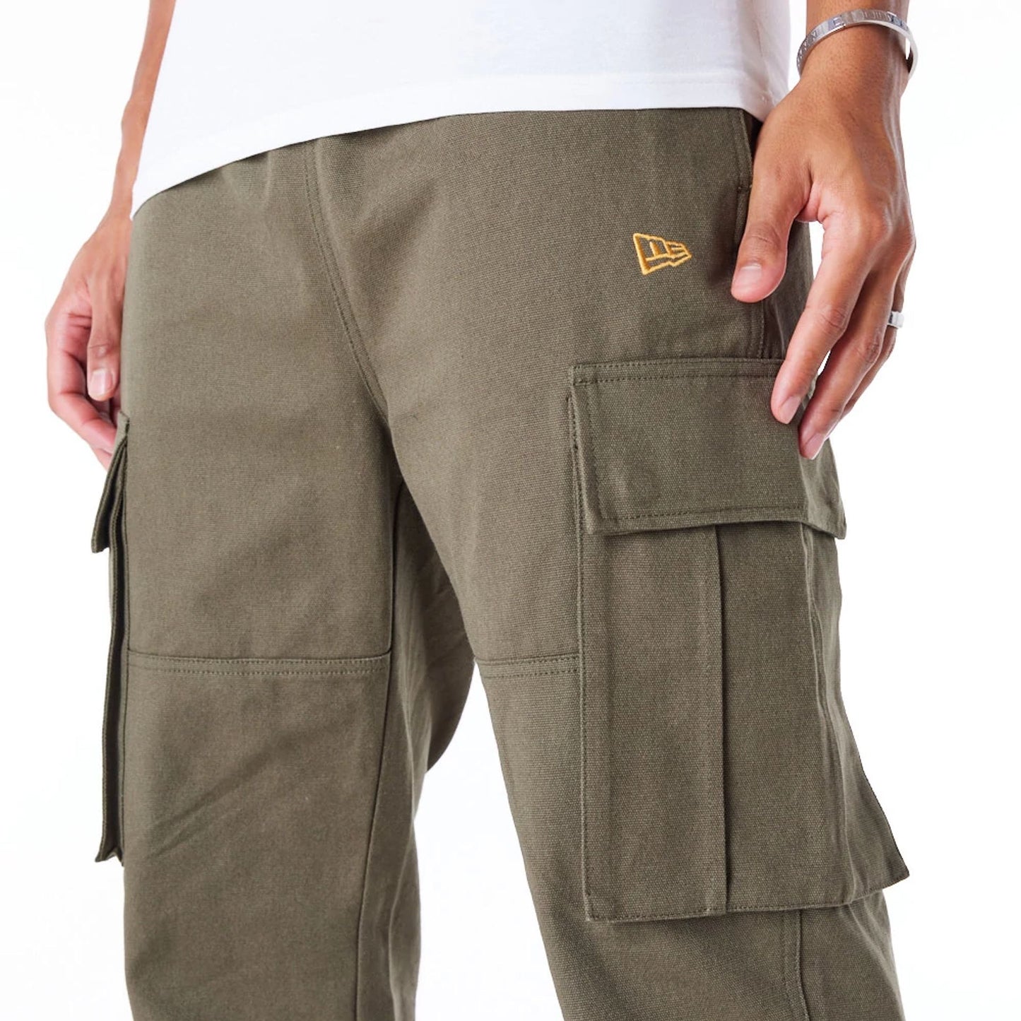 The Male model is wearing New Era Green Cargo Trousers 7