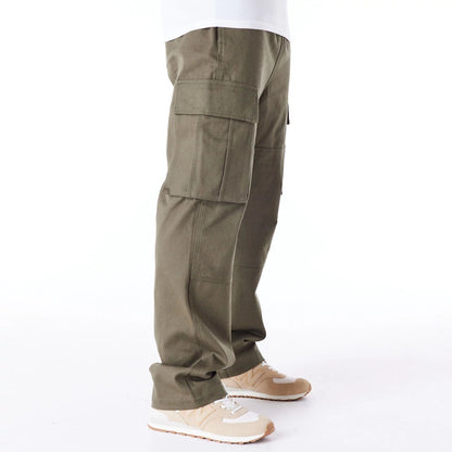 The Male model is wearing New Era Green Cargo Trousers 6