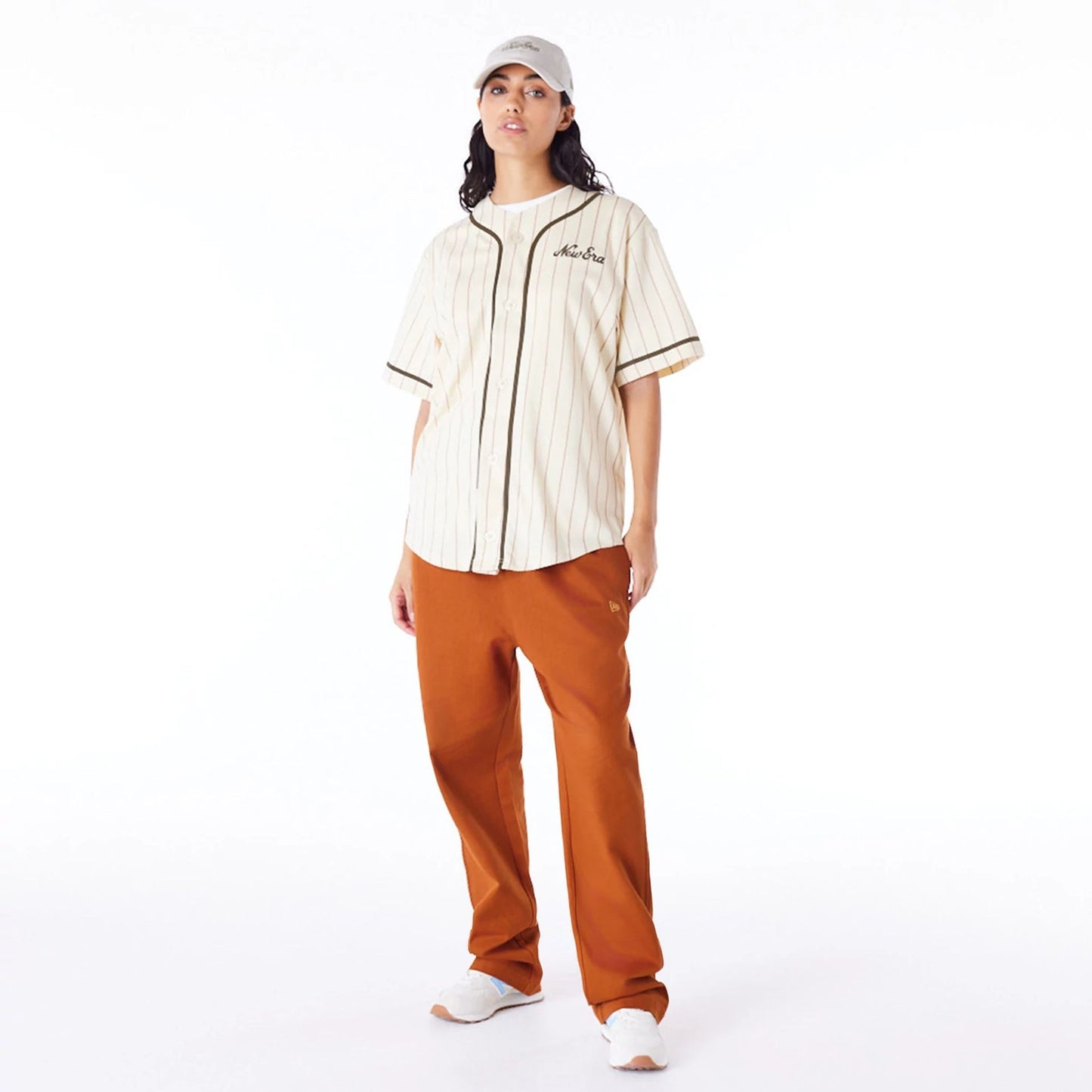 The Male model is wearing New Era Pinstripe Light Beige T-Shirt 5