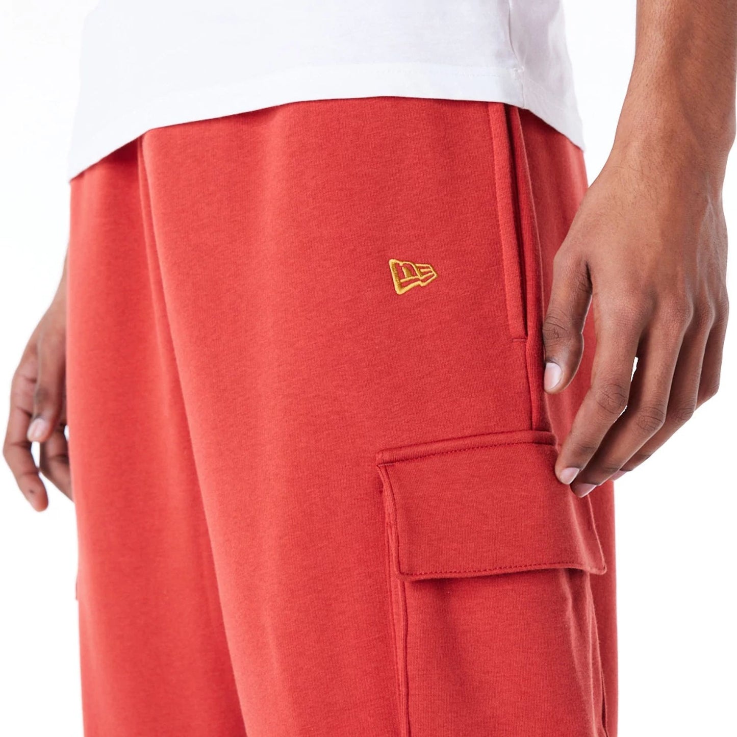 The Male model is wearing New Era Script Red Fleece Cargo Joggers 6