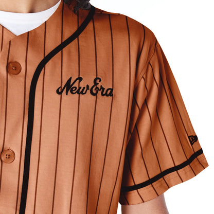 The Male model is wearing New Era Pinstripe Brown T-Shirt 3