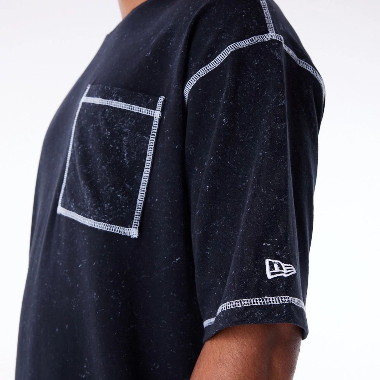 The Male model is wearing New Era Wash Black Oversized T-Shirt 7