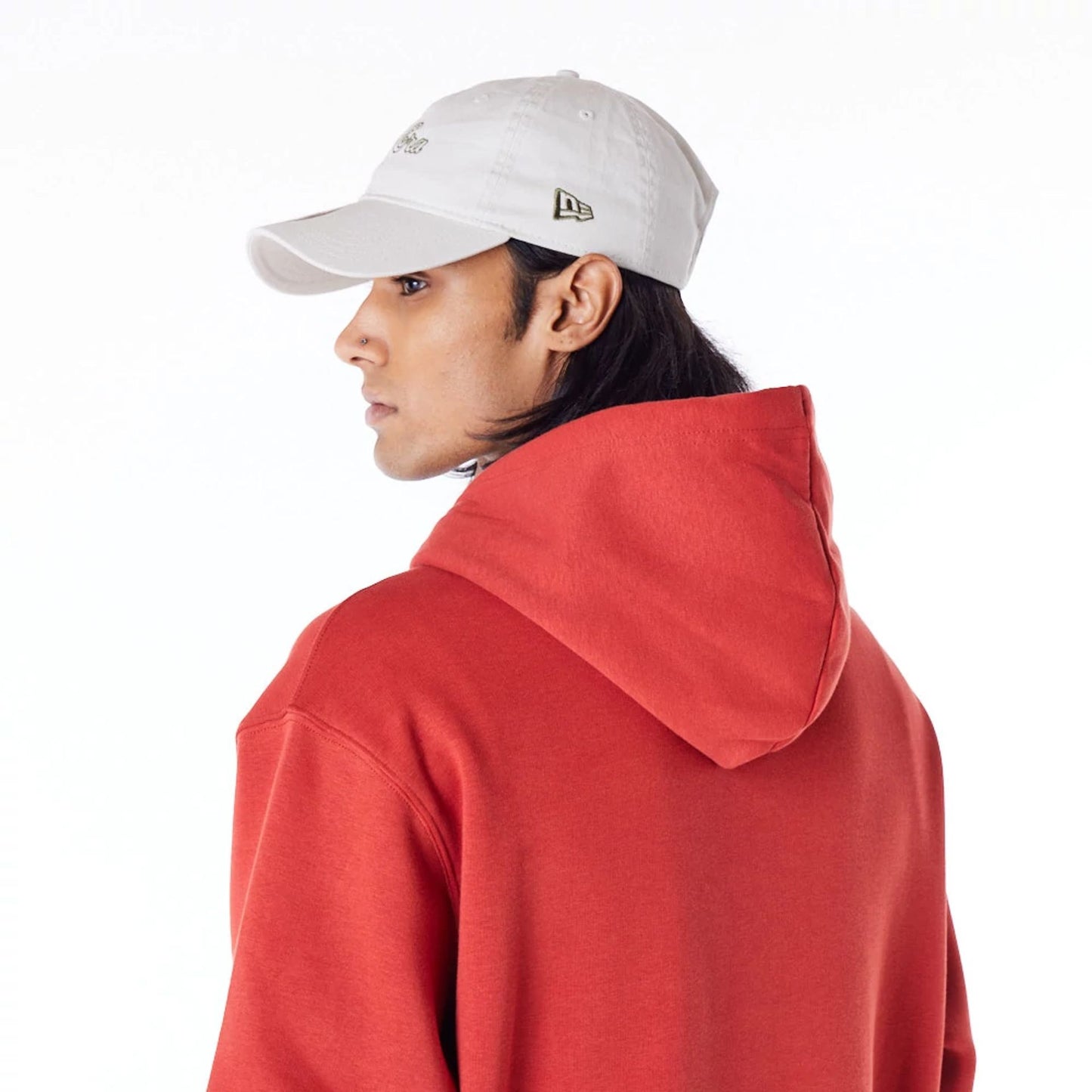 The Male model is wearing New Era Script Logo Red Oversized Pullover Hoodie 7