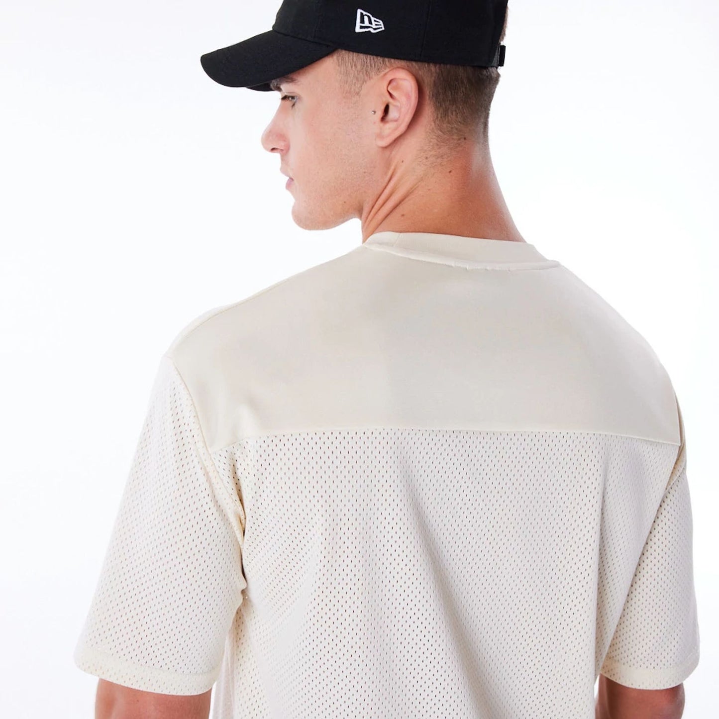 The Male model is wearing New Era Mesh Stone Jersey 6