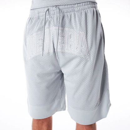 The Male model is wearing New Era Mesh Grey Oversized Shorts 2