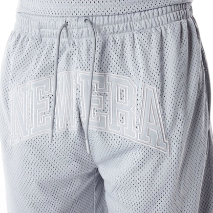 The Male model is wearing New Era Mesh Grey Oversized Shorts 4