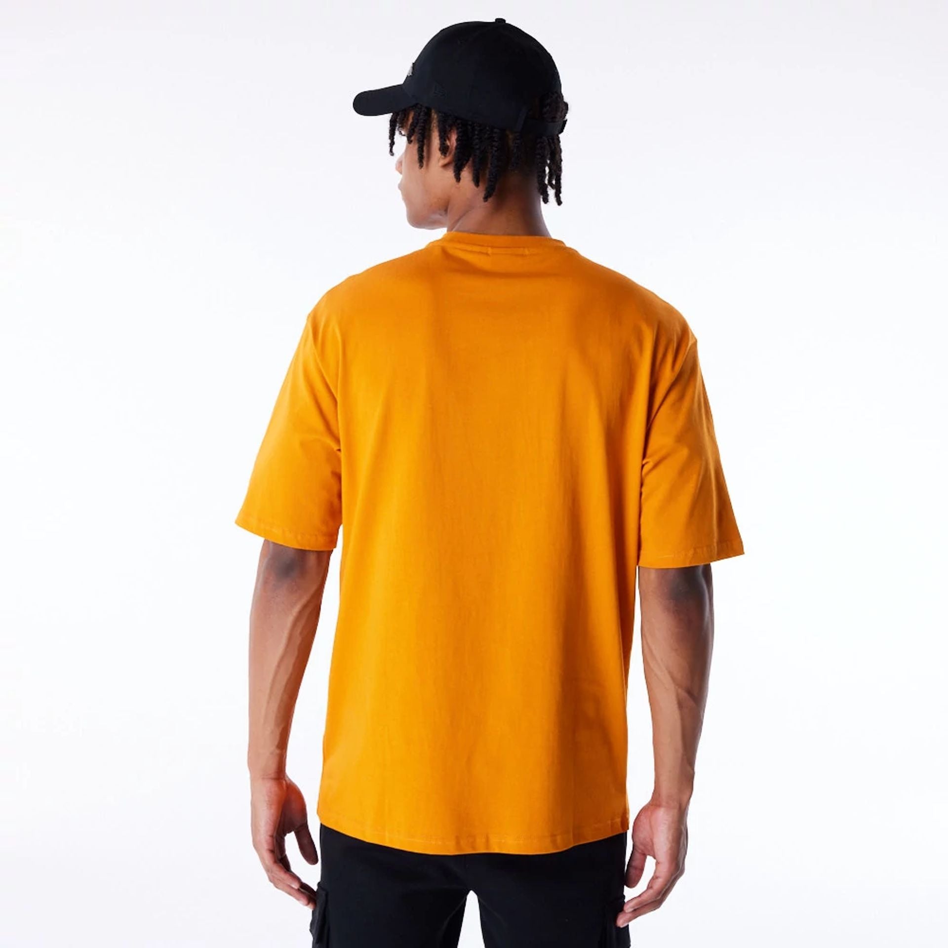 The Male model is wearing New Era Font Graphic Orange Oversized T-Shirt 2