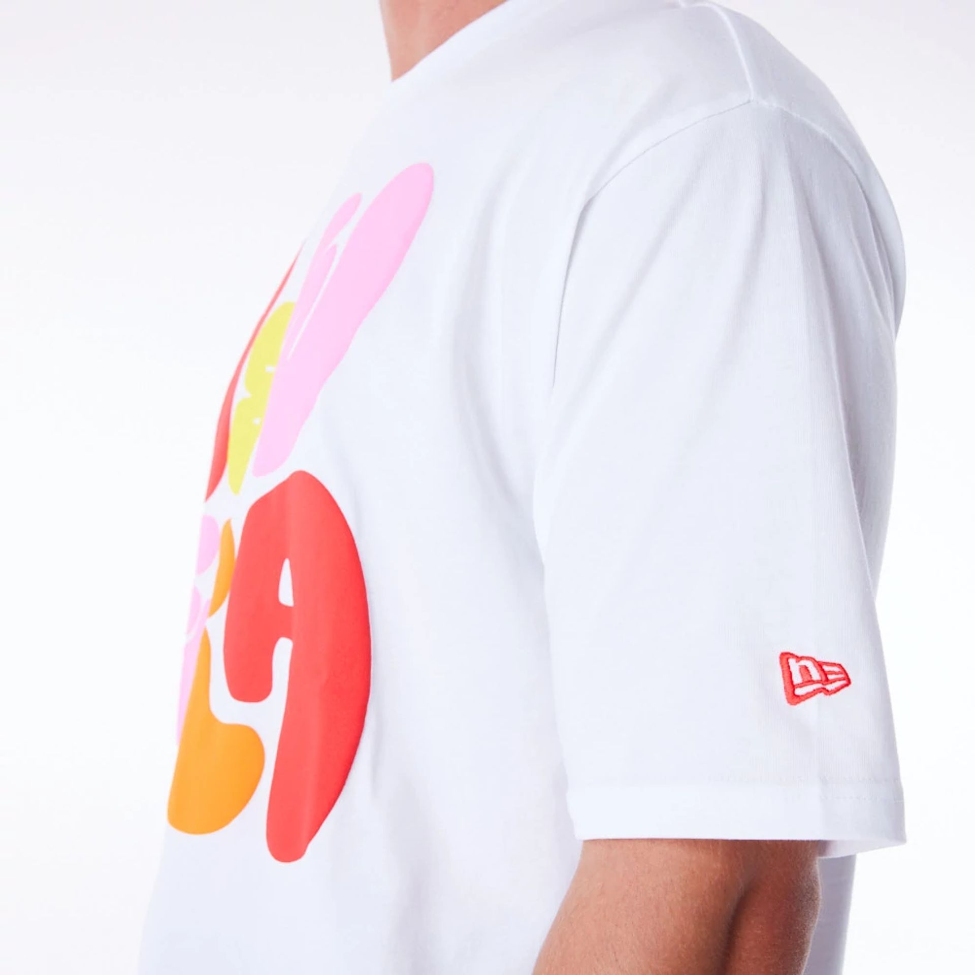 The Male model is wearing New Era Font Graphic White Oversized T-Shirt 6