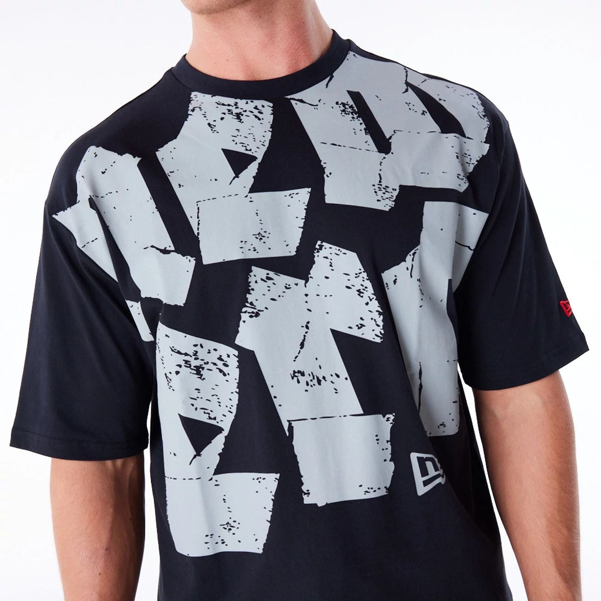 The Male model is wearing New Era Font Graphic Black Oversized T-Shirt 5