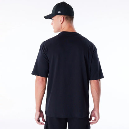 The Male model is wearing New Era Font Graphic Black Oversized T-Shirt 4