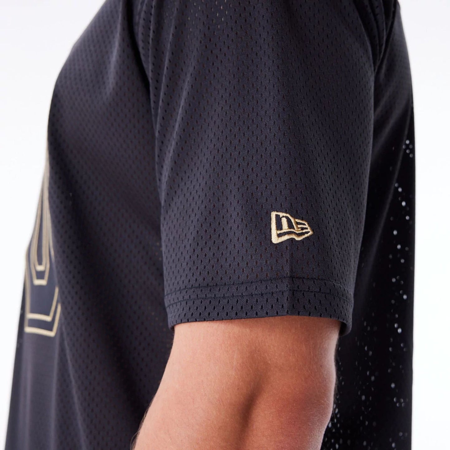 The Male model is wearing New Era Mesh Black Jersey 2