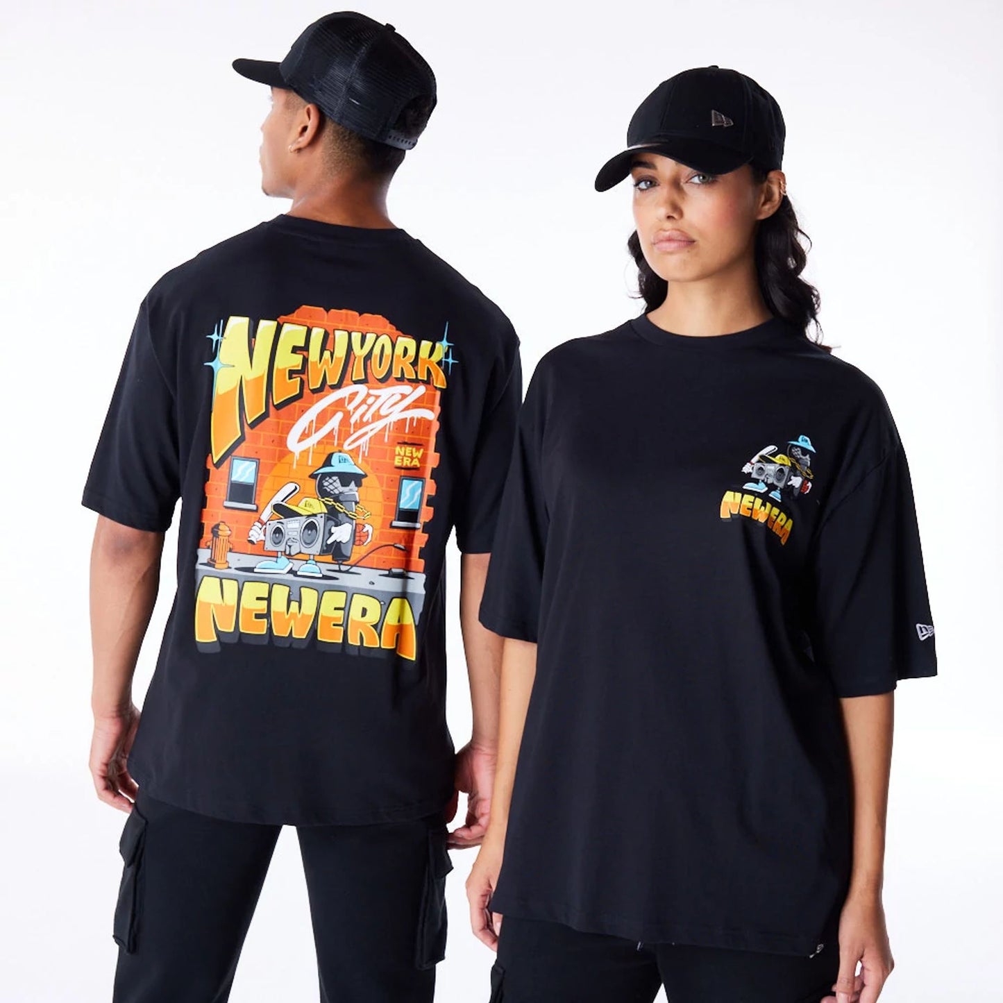 The Male model is wearing New Era Location Graphic New York Black Oversized T-Shirt 1