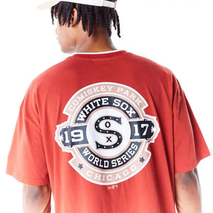 The Male model is wearing Chicago White Sox World Series Copper Drop Shoulder T-Shirt  9