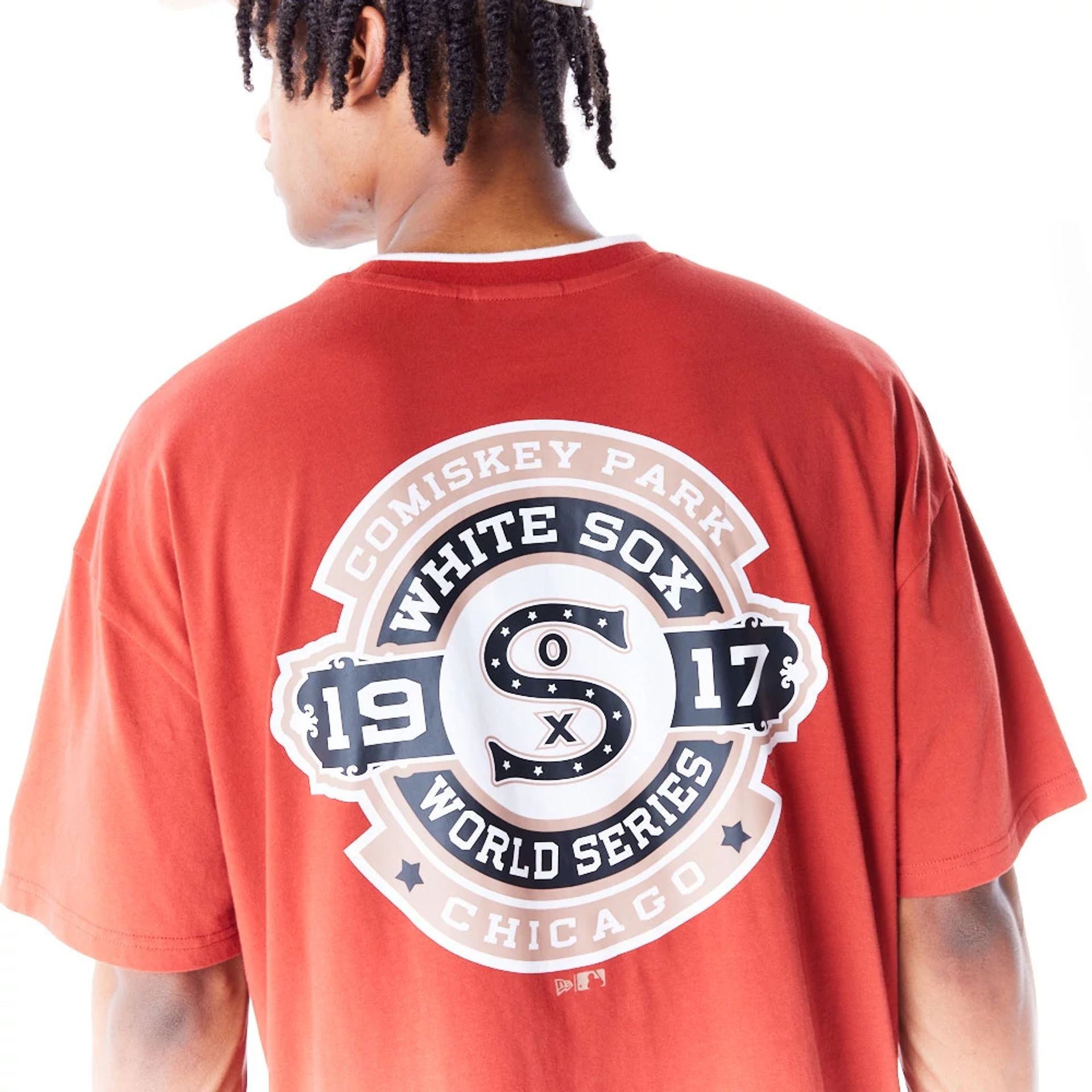 The Male model is wearing Chicago White Sox World Series Copper Drop Shoulder T-Shirt  6